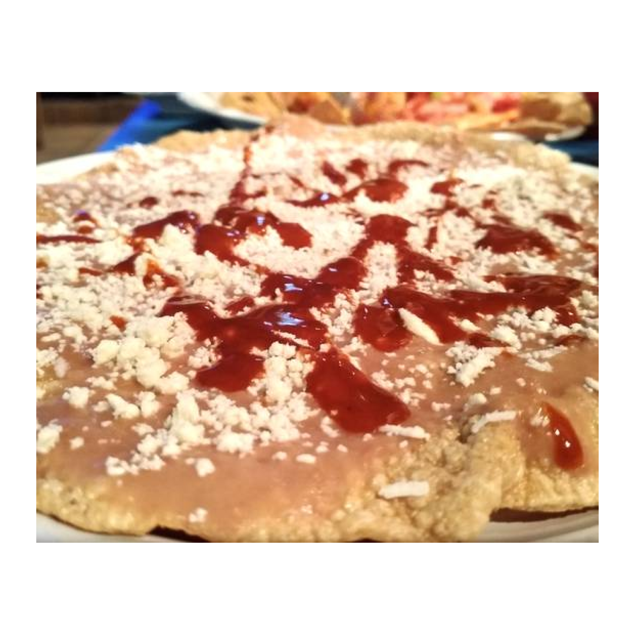 Tostachona de frijol y queso